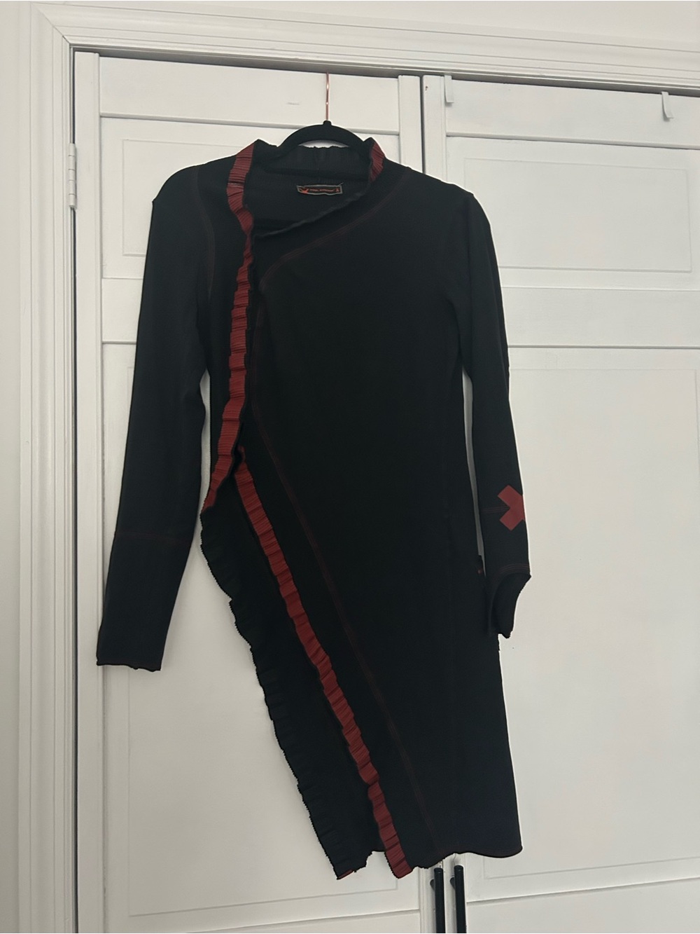 Cop.Copine Black Long-Sleeve Top with Red Ruffle Trim